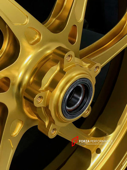 We manufacture premium quality forged motorcycle wheels rims for DUCATI PANIGALE V4 V4S V4R V4 SP2 in any design, size, color.

Wheel sizes (motorcycle spec):

Front: 3.5 x 17

Rear: 6 x 17

Weight:

Front: 3.3 kg (7.27 lbs)

Rear: 3.45 kg (7.6 lbs)


Finishing: Satin Gold

Forza Performance Group engineers and manufactures each forged motorcycle wheel individually per order. This ensures precise fitment, uncompromised strength, and unique styling. Whether for racing, touring, or daily use — our wheels are 