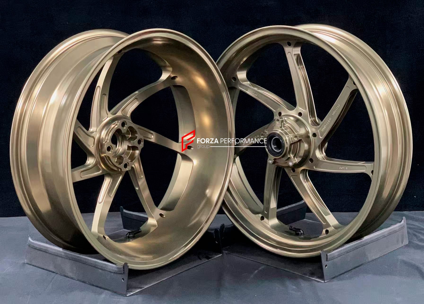 We manufacture premium quality forged motorcycle wheels rims for DUCATI PANIGALE V4 V4S V4R V4 SP2 in any design, size, color.

Wheel sizes (motorcycle spec):

Front: 3.5 x 17

Rear: 6 x 17

Weight:

Front: 3.85 kg (8.49 lbs)

Rear: 4.2 kg (9.26 lbs)


Finishing: Satin Light Gold

Forza Performance Group engineers and manufactures each forged motorcycle wheel individually per order. This ensures precise fitment, uncompromised strength, and unique styling. Whether for racing, touring, or daily use — our whee