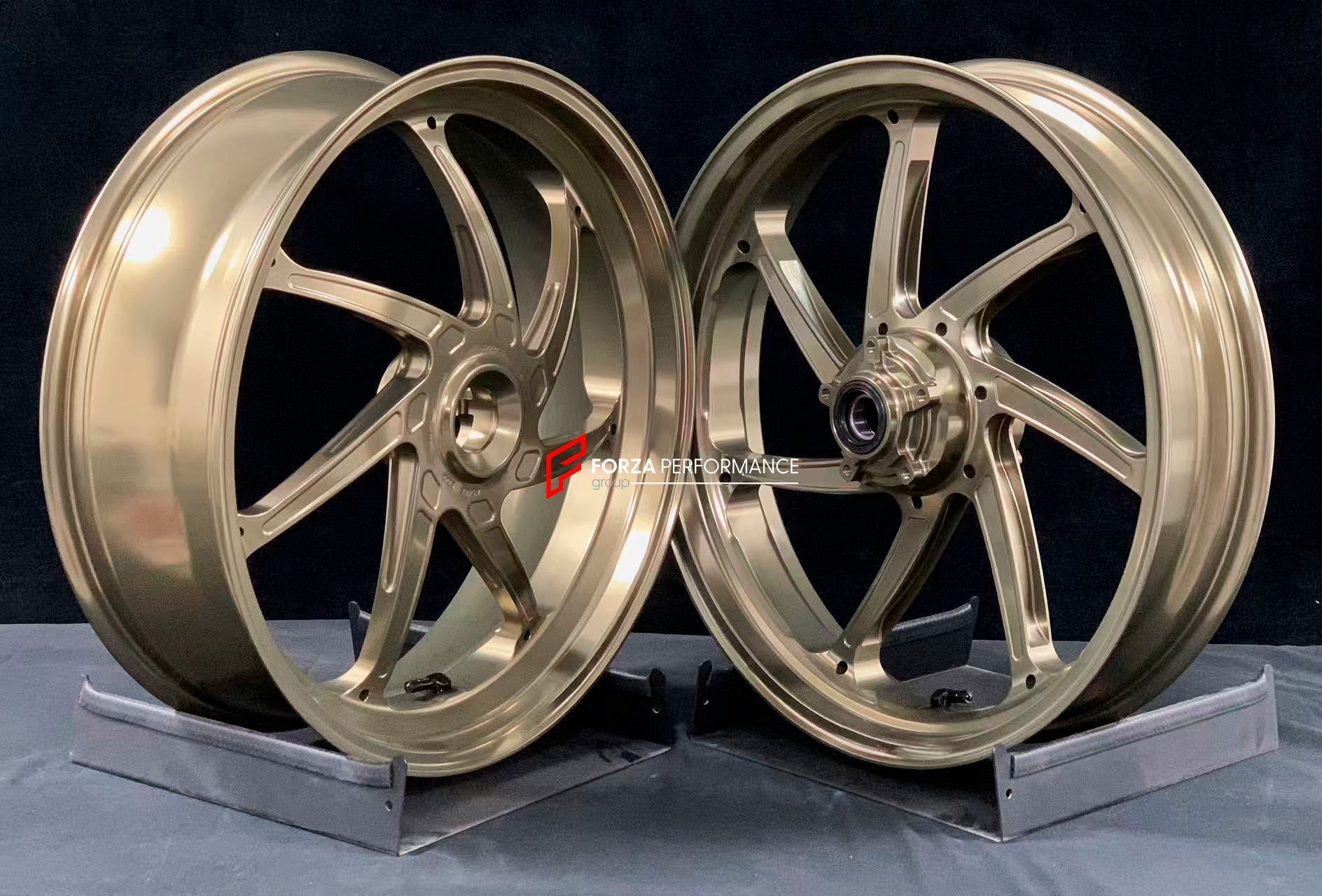 We manufacture premium quality forged motorcycle wheels rims for DUCATI PANIGALE V4 V4S V4R V4 SP2 in any design, size, color.

Wheel sizes (motorcycle spec):

Front: 3.5 x 17

Rear: 6 x 17

Weight:

Front: 3.85 kg (8.49 lbs)

Rear: 4.2 kg (9.26 lbs)


Finishing: Satin Light Gold

Forza Performance Group engineers and manufactures each forged motorcycle wheel individually per order. This ensures precise fitment, uncompromised strength, and unique styling. Whether for racing, touring, or daily use — our whee