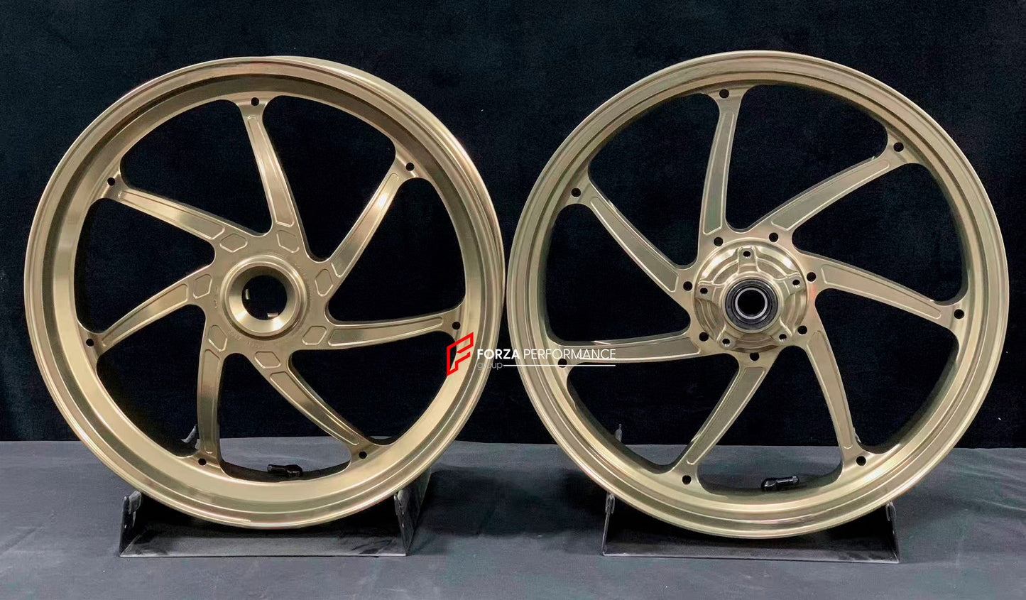 We manufacture premium quality forged motorcycle wheels rims for DUCATI PANIGALE V4 V4S V4R V4 SP2 in any design, size, color.

Wheel sizes (motorcycle spec):

Front: 3.5 x 17

Rear: 6 x 17

Weight:

Front: 3.85 kg (8.49 lbs)

Rear: 4.2 kg (9.26 lbs)


Finishing: Satin Light Gold

Forza Performance Group engineers and manufactures each forged motorcycle wheel individually per order. This ensures precise fitment, uncompromised strength, and unique styling. Whether for racing, touring, or daily use — our whee