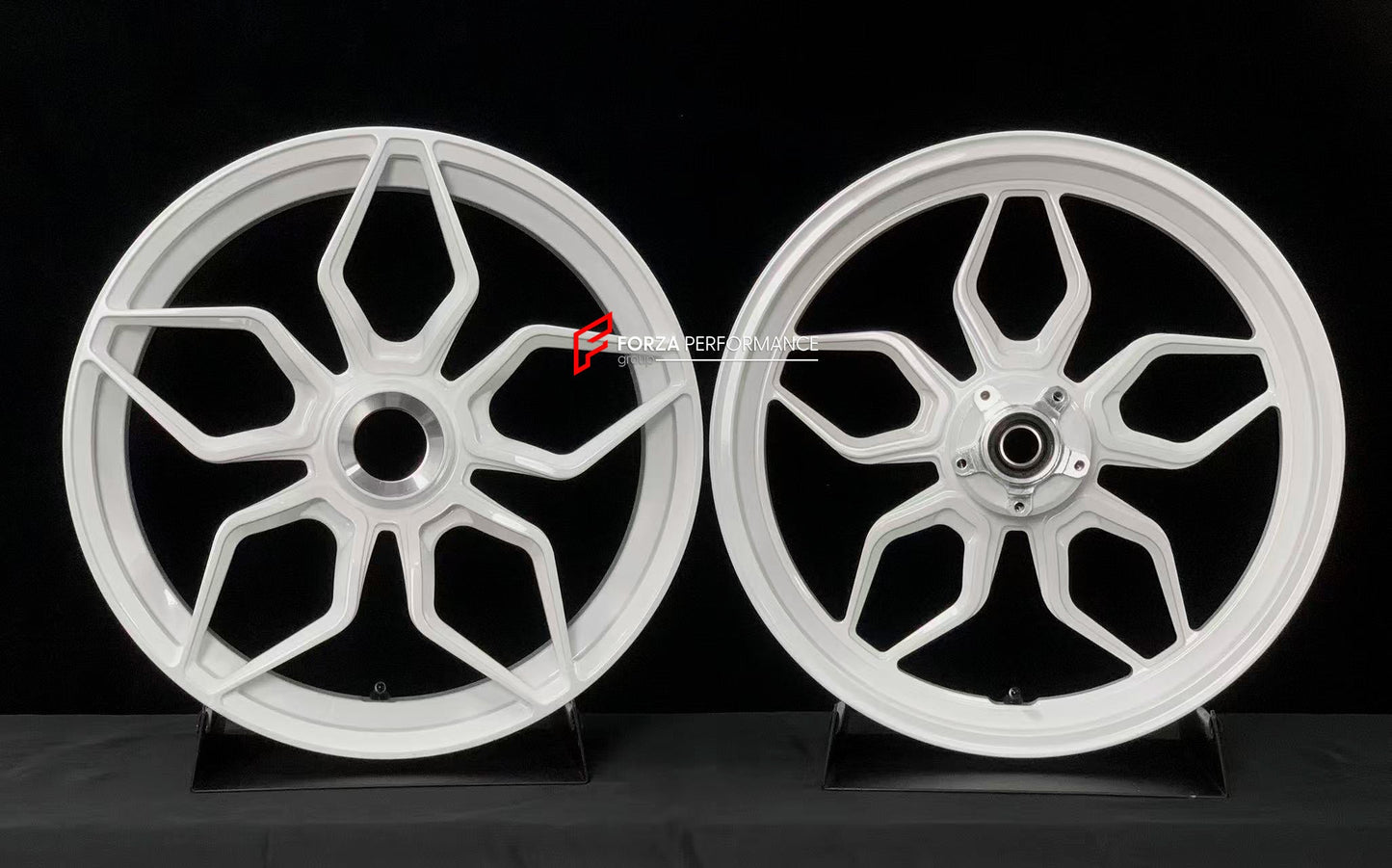 We manufacture premium quality forged motorcycle wheels rims for DUCATI PANIGALE V4 V4S V4R V4 SP2 in any design, size, color.

Wheel sizes (motorcycle spec):

Front: 3.5 x 17

Rear: 6 x 17

Weight:

Front: 4.45 kg (9.81 lbs)

Rear: 4.5 kg (9.92 lbs)


Finishing: Gloss White

Forza Performance Group engineers and manufactures each forged motorcycle wheel individually per order. This ensures precise fitment, uncompromised strength, and unique styling. Whether for racing, touring, or daily use — our wheels ar