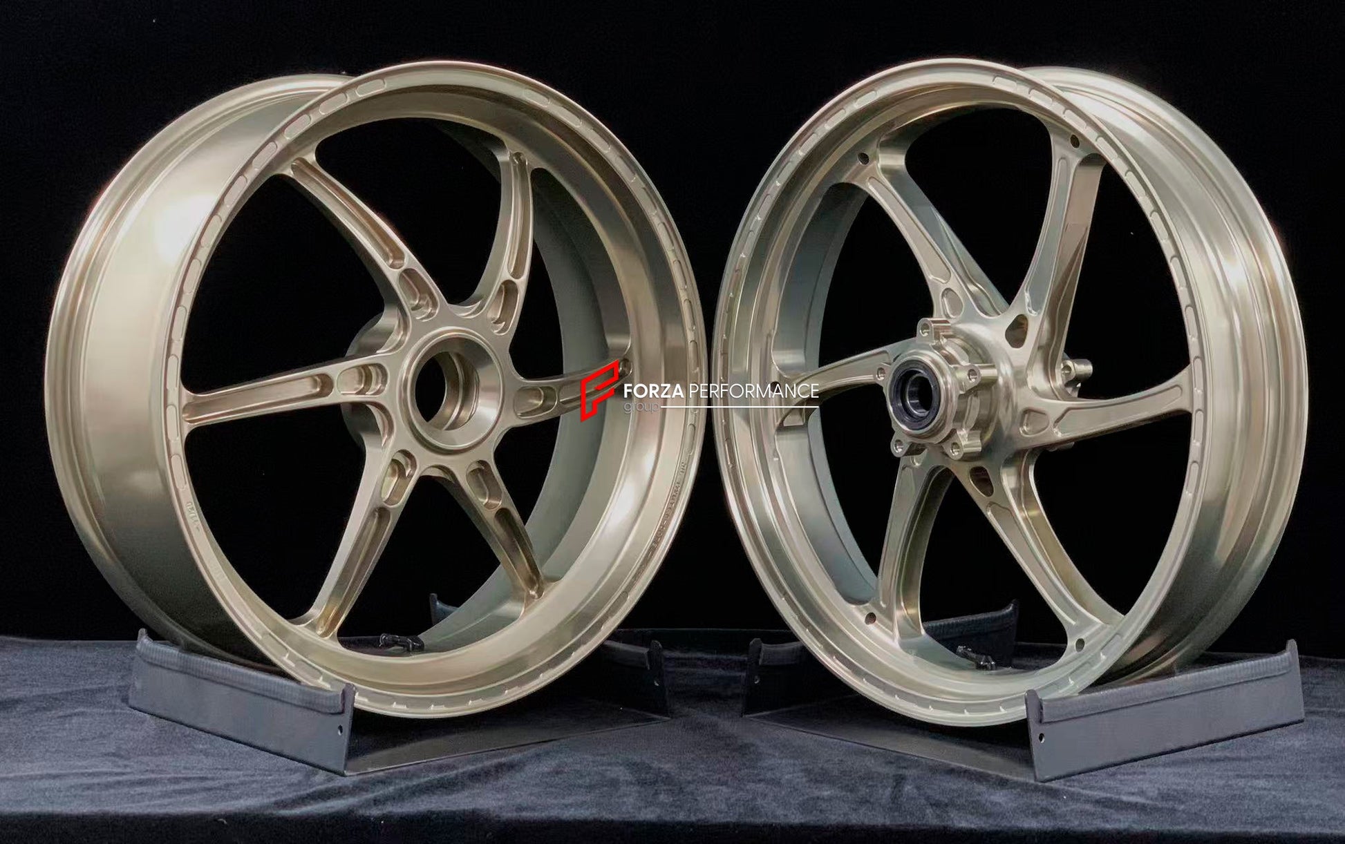 We manufacture premium quality forged motorcycle wheels rims for DUCATI PANIGALE V4 V4S V4R V4 SP2 in any design, size, color.

Wheel sizes (motorcycle spec):

Front: 3.5 x 17

Rear: 6 x 17

Weight:

Front: 3.4 kg (7.45 lbs)

Rear: 3.6 kg (7.94 lbs)


Finishing: Satin Bronze

Forza Performance Group engineers and manufactures each forged motorcycle wheel individually per order. This ensures precise fitment, uncompromised strength, and unique styling. Whether for racing, touring, or daily use — our wheels ar