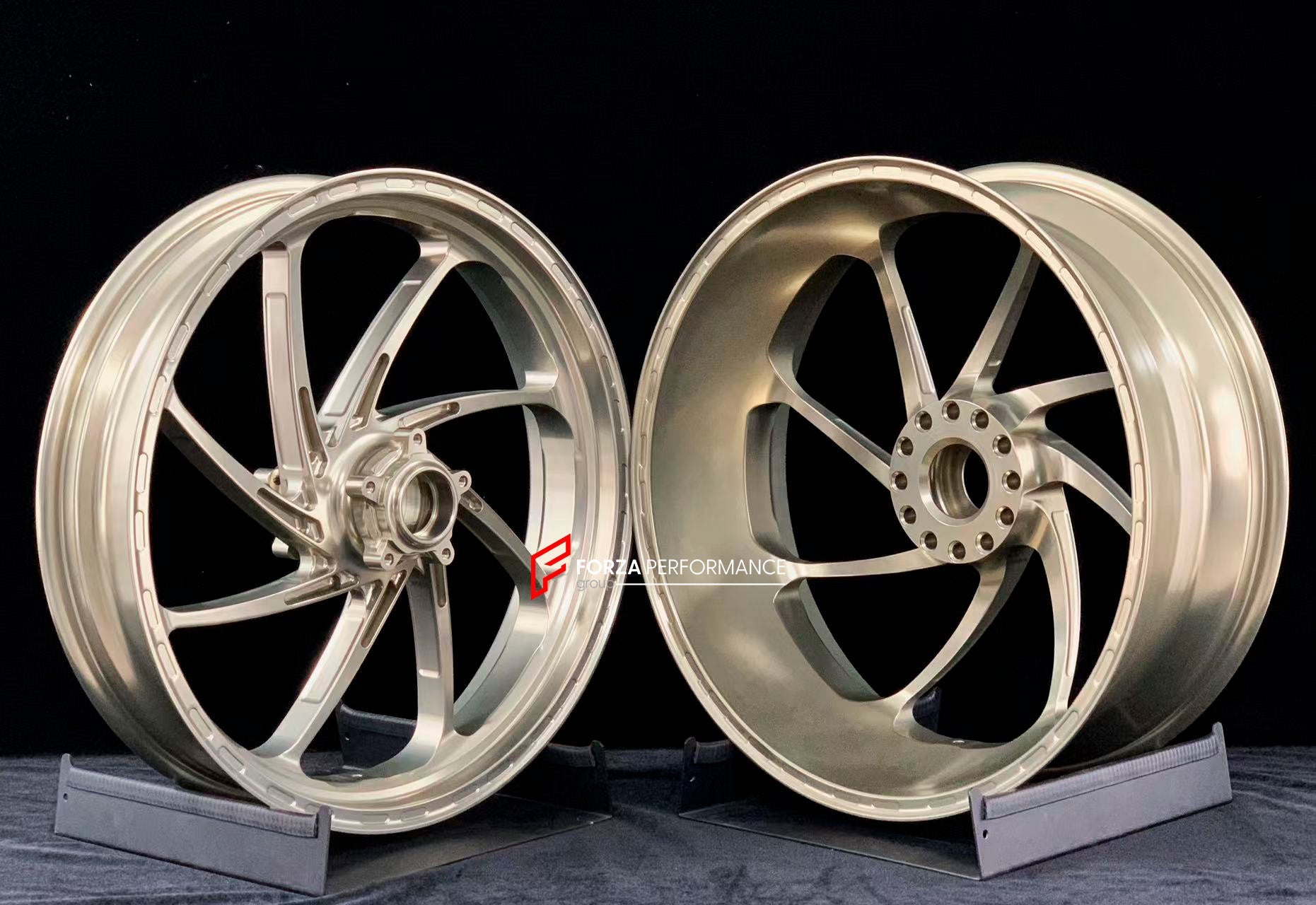 We manufacture premium quality forged motorcycle wheels rims for DUCATI PANIGALE V4 V4S V4R V4 SP2 in any design, size, color.

Wheel sizes (motorcycle spec):

Front: 3.5 x 17

Rear: 6 x 17

Weight:

Front: 3.85 kg (8.05 lbs)

Rear: 3.65 kg (8.49 lbs)


Finishing: Gloss Light Gold

Forza Performance Group engineers and manufactures each forged motorcycle wheel individually per order. This ensures precise fitment, uncompromised strength, and unique styling. Whether for racing, touring, or daily use — our whe