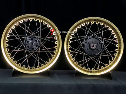 We manufacture premium quality forged motorcycle wheels rims for KTM 390 in any design, size, color.

Wheel sizes (motorcycle spec):

Front: 3.5 x 19

Rear: 4.5 x 17

Weight:

Front: 5.2 kg (11.46 lbs)

Rear: 6.25 kg (13.78 lbs)


Finishing: Gloss Gold

Forza Performance Group engineers and manufactures each forged motorcycle wheel individually per order. This ensures precise fitment, uncompromised strength, and unique styling. Whether for racing, touring, or daily use — our wheels are built for both perfor