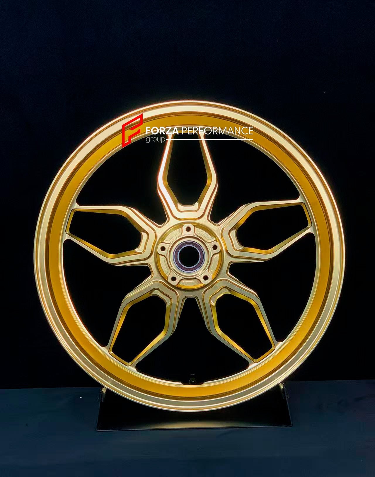 We manufacture premium quality forged motorcycle wheels rims for KTM 1290 in any design, size, color.

Wheel sizes (motorcycle spec):

Front: 3.5 x 17

Rear: 6 x 17

Weight:

Front: 3.8 kg (8.38 lbs)

Rear: 4.1 kg (9.04 lbs)

Finishing: Gloss Gold

Forza Performance Group engineers and manufactures each forged motorcycle wheel individually per order. This ensures precise fitment, uncompromised strength, and unique styling. Whether for racing, touring, or daily use — our wheels are built for both performance