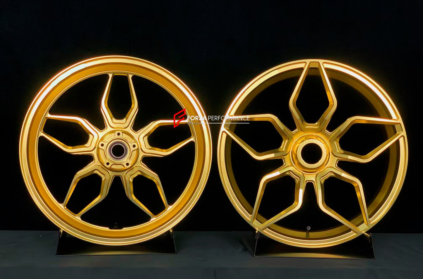We manufacture premium quality forged motorcycle wheels rims for KTM 1290 in any design, size, color.

Wheel sizes (motorcycle spec):

Front: 3.5 x 17

Rear: 6 x 17

Weight:

Front: 3.8 kg (8.38 lbs)

Rear: 4.1 kg (9.04 lbs)

Finishing: Gloss Gold

Forza Performance Group engineers and manufactures each forged motorcycle wheel individually per order. This ensures precise fitment, uncompromised strength, and unique styling. Whether for racing, touring, or daily use — our wheels are built for both performance