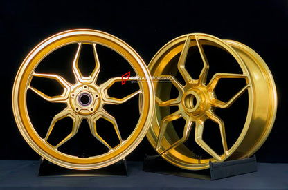 We manufacture premium quality forged motorcycle wheels rims for KTM 1290 in any design, size, color.

Wheel sizes (motorcycle spec):

Front: 3.5 x 17

Rear: 6 x 17

Weight:

Front: 3.8 kg (8.38 lbs)

Rear: 4.1 kg (9.04 lbs)

Finishing: Gloss Gold

Forza Performance Group engineers and manufactures each forged motorcycle wheel individually per order. This ensures precise fitment, uncompromised strength, and unique styling. Whether for racing, touring, or daily use — our wheels are built for both performance