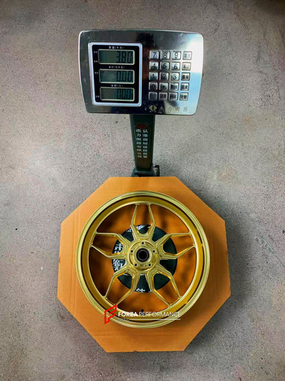 We manufacture premium quality forged motorcycle wheels rims for KTM 1290 in any design, size, color.

Wheel sizes (motorcycle spec):

Front: 3.5 x 17

Rear: 6 x 17

Weight:

Front: 3.8 kg (8.38 lbs)

Rear: 4.1 kg (9.04 lbs)

Finishing: Gloss Gold

Forza Performance Group engineers and manufactures each forged motorcycle wheel individually per order. This ensures precise fitment, uncompromised strength, and unique styling. Whether for racing, touring, or daily use — our wheels are built for both performance