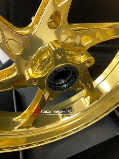 We manufacture premium quality forged motorcycle wheels rims for KTM 790 890 in any design, size, color.

Wheel sizes (motorcycle spec):

Front: 3.5 x 17

Rear: 5.5 x 17

Weight:

Front: 3.25 kg (7.16 lbs)

Rear: 4.65 kg (10.25 lbs)


Finishing: Gloss Gold

Forza Performance Group engineers and manufactures each forged motorcycle wheel individually per order. This ensures precise fitment, uncompromised strength, and unique styling. Whether for racing, touring, or daily use — our wheels are built for both pe