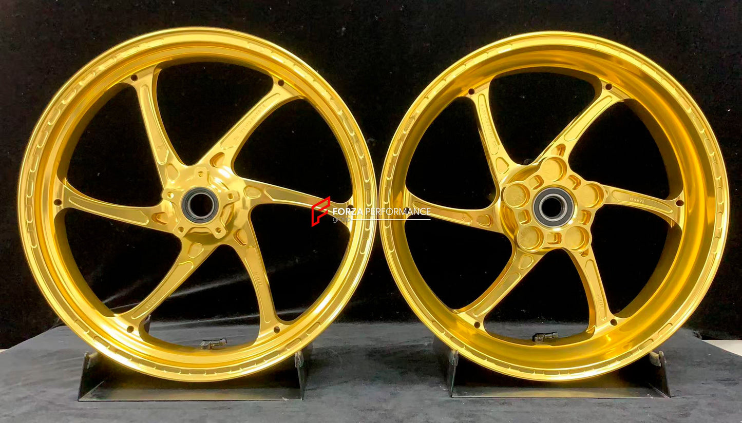 We manufacture premium quality forged motorcycle wheels rims for KTM 790 890 in any design, size, color.

Wheel sizes (motorcycle spec):

Front: 3.5 x 17

Rear: 5.5 x 17

Weight:

Front: 3.25 kg (7.16 lbs)

Rear: 4.65 kg (10.25 lbs)


Finishing: Gloss Gold

Forza Performance Group engineers and manufactures each forged motorcycle wheel individually per order. This ensures precise fitment, uncompromised strength, and unique styling. Whether for racing, touring, or daily use — our wheels are built for both pe