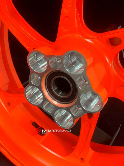 We manufacture premium quality forged motorcycle wheels rims for KTM 790 890 in any design, size, color.

Wheel sizes (motorcycle spec):

Front: 3.5 x 17

Rear: 5.5 x 17

Weight:

Front: 3.35 kg (7.38 lbs)

Rear: 4.75 kg (10.47 lbs)


Finishing: KTM Orange

Forza Performance Group engineers and manufactures each forged motorcycle wheel individually per order. This ensures precise fitment, uncompromised strength, and unique styling. Whether for racing, touring, or daily use — our wheels are built for both pe