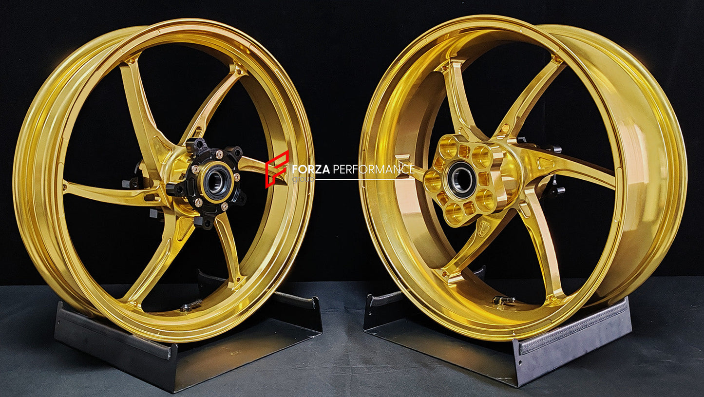 We manufacture premium quality forged motorcycle wheels rims for QJMOTOR in any design, size, color.

Wheel sizes (motorcycle spec):

Front: 3.5 x 17

Rear: 6 x 17

Weight:

Front: 3.9 kg (8.6 lbs)

Rear: 4.95 kg (10.91 lbs)


Finishing: Satin Gold

Forza Performance Group engineers and manufactures each forged motorcycle wheel individually per order. This ensures precise fitment, uncompromised strength, and unique styling. Whether for racing, touring, or daily use — our wheels are built for both performanc