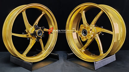 We manufacture premium quality forged motorcycle wheels rims for QJMOTOR in any design, size, color.

Wheel sizes (motorcycle spec):

Front: 3.5 x 17

Rear: 6 x 17

Weight:

Front: 3.9 kg (8.6 lbs)

Rear: 4.95 kg (10.91 lbs)


Finishing: Satin Gold

Forza Performance Group engineers and manufactures each forged motorcycle wheel individually per order. This ensures precise fitment, uncompromised strength, and unique styling. Whether for racing, touring, or daily use — our wheels are built for both performanc