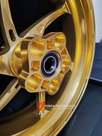 We manufacture premium quality forged motorcycle wheels rims for QJMOTOR in any design, size, color.

Wheel sizes (motorcycle spec):

Front: 3.5 x 17

Rear: 6 x 17

Weight:

Front: 3.9 kg (8.6 lbs)

Rear: 4.95 kg (10.91 lbs)


Finishing: Satin Gold

Forza Performance Group engineers and manufactures each forged motorcycle wheel individually per order. This ensures precise fitment, uncompromised strength, and unique styling. Whether for racing, touring, or daily use — our wheels are built for both performanc