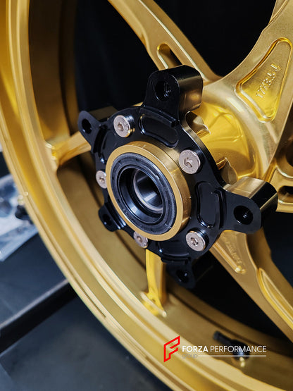 We manufacture premium quality forged motorcycle wheels rims for QJMOTOR in any design, size, color.

Wheel sizes (motorcycle spec):

Front: 3.5 x 17

Rear: 6 x 17

Weight:

Front: 3.9 kg (8.6 lbs)

Rear: 4.95 kg (10.91 lbs)


Finishing: Satin Gold

Forza Performance Group engineers and manufactures each forged motorcycle wheel individually per order. This ensures precise fitment, uncompromised strength, and unique styling. Whether for racing, touring, or daily use — our wheels are built for both performanc
