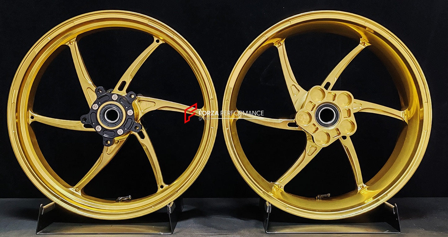 We manufacture premium quality forged motorcycle wheels rims for QJMOTOR in any design, size, color.

Wheel sizes (motorcycle spec):

Front: 3.5 x 17

Rear: 6 x 17

Weight:

Front: 3.9 kg (8.6 lbs)

Rear: 4.95 kg (10.91 lbs)


Finishing: Satin Gold

Forza Performance Group engineers and manufactures each forged motorcycle wheel individually per order. This ensures precise fitment, uncompromised strength, and unique styling. Whether for racing, touring, or daily use — our wheels are built for both performanc