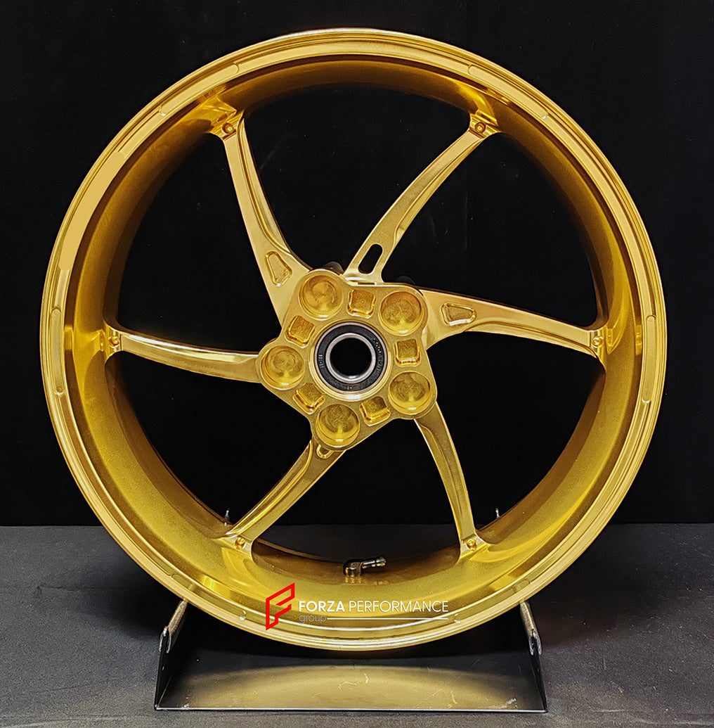 We manufacture premium quality forged motorcycle wheels rims for QJMOTOR in any design, size, color.

Wheel sizes (motorcycle spec):

Front: 3.5 x 17

Rear: 6 x 17

Weight:

Front: 3.9 kg (8.6 lbs)

Rear: 4.95 kg (10.91 lbs)


Finishing: Satin Gold

Forza Performance Group engineers and manufactures each forged motorcycle wheel individually per order. This ensures precise fitment, uncompromised strength, and unique styling. Whether for racing, touring, or daily use — our wheels are built for both performanc