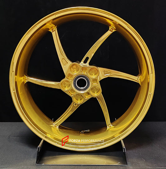We manufacture premium quality forged motorcycle wheels rims for QJMOTOR in any design, size, color.

Wheel sizes (motorcycle spec):

Front: 3.5 x 17

Rear: 6 x 17

Weight:

Front: 3.9 kg (8.6 lbs)

Rear: 4.95 kg (10.91 lbs)


Finishing: Satin Gold

Forza Performance Group engineers and manufactures each forged motorcycle wheel individually per order. This ensures precise fitment, uncompromised strength, and unique styling. Whether for racing, touring, or daily use — our wheels are built for both performanc