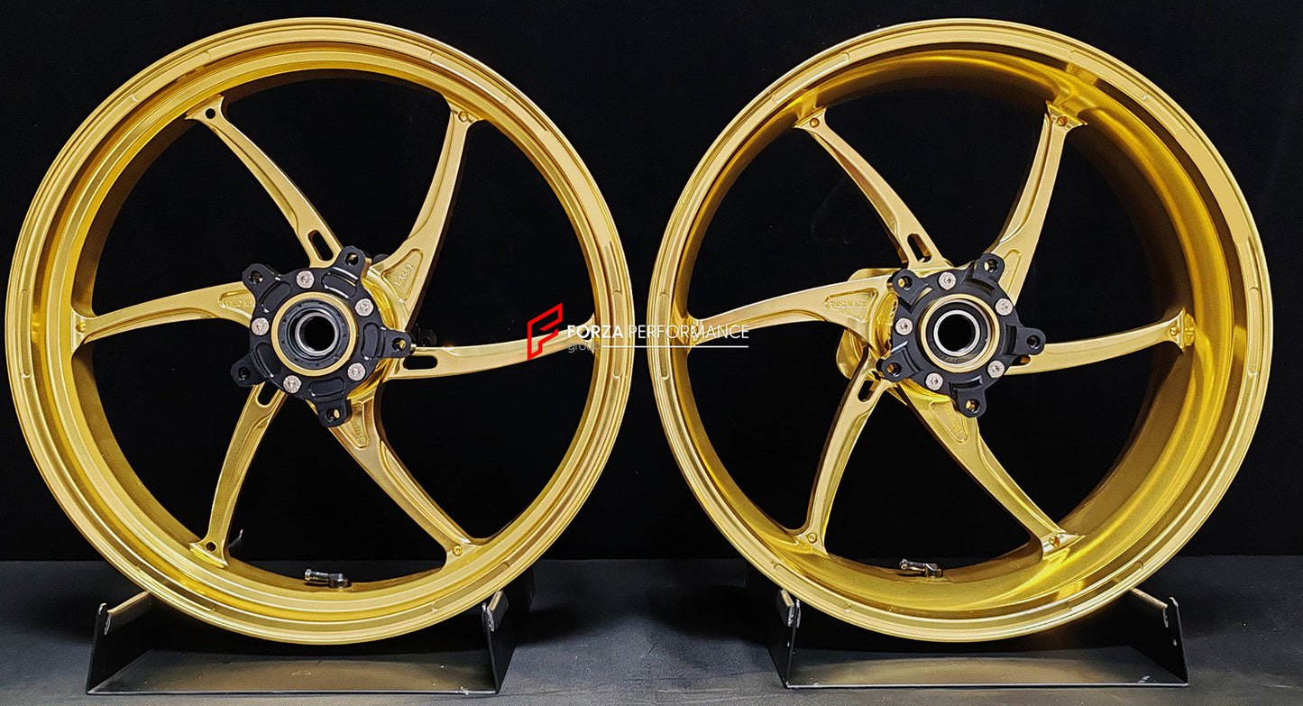 We manufacture premium quality forged motorcycle wheels rims for QJMOTOR in any design, size, color.

Wheel sizes (motorcycle spec):

Front: 3.5 x 17

Rear: 6 x 17

Weight:

Front: 3.9 kg (8.6 lbs)

Rear: 4.95 kg (10.91 lbs)


Finishing: Satin Gold

Forza Performance Group engineers and manufactures each forged motorcycle wheel individually per order. This ensures precise fitment, uncompromised strength, and unique styling. Whether for racing, touring, or daily use — our wheels are built for both performanc