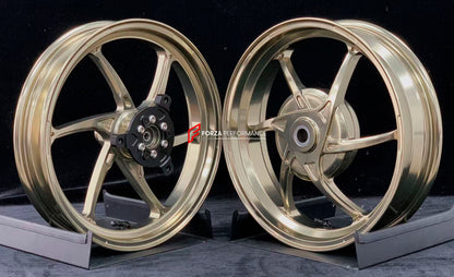 We manufacture premium quality forged motorcycle wheels rims for YAMAHA in any design, size, color.

Wheel sizes (motorcycle spec):

Front: 2.5 x 14

Rear: 3.5 x 14

Weight:

Front: 2.7 kg (5.95 lbs)

Rear: 2.85 kg (6.28 lbs)


Finishing: Gloss Bronze

Forza Performance Group engineers and manufactures each forged motorcycle wheel individually per order. This ensures precise fitment, uncompromised strength, and unique styling. Whether for racing, touring, or daily use — our wheels are built for both perform