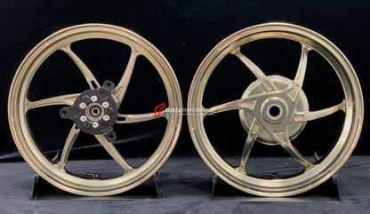 We manufacture premium quality forged motorcycle wheels rims for YAMAHA in any design, size, color.

Wheel sizes (motorcycle spec):

Front: 2.5 x 14

Rear: 3.5 x 14

Weight:

Front: 2.7 kg (5.95 lbs)

Rear: 2.85 kg (6.28 lbs)


Finishing: Gloss Bronze

Forza Performance Group engineers and manufactures each forged motorcycle wheel individually per order. This ensures precise fitment, uncompromised strength, and unique styling. Whether for racing, touring, or daily use — our wheels are built for both perform