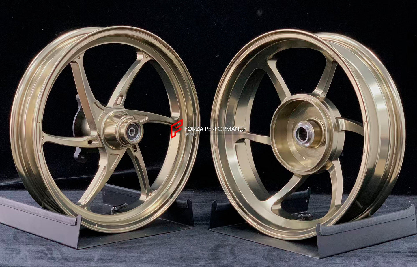 We manufacture premium quality forged motorcycle wheels rims for YAMAHA in any design, size, color.

Wheel sizes (motorcycle spec):

Front: 2.5 x 14

Rear: 3.5 x 14

Weight:

Front: 2.7 kg (5.95 lbs)

Rear: 2.85 kg (6.28 lbs)


Finishing: Gloss Bronze

Forza Performance Group engineers and manufactures each forged motorcycle wheel individually per order. This ensures precise fitment, uncompromised strength, and unique styling. Whether for racing, touring, or daily use — our wheels are built for both perform