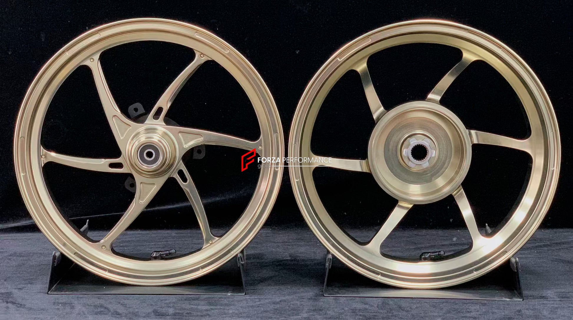 We manufacture premium quality forged motorcycle wheels rims for YAMAHA in any design, size, color.

Wheel sizes (motorcycle spec):

Front: 2.5 x 14

Rear: 3.5 x 14

Weight:

Front: 2.7 kg (5.95 lbs)

Rear: 2.85 kg (6.28 lbs)


Finishing: Gloss Bronze

Forza Performance Group engineers and manufactures each forged motorcycle wheel individually per order. This ensures precise fitment, uncompromised strength, and unique styling. Whether for racing, touring, or daily use — our wheels are built for both perform