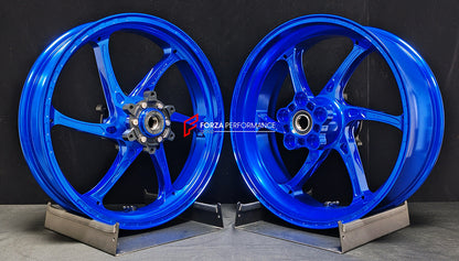 We manufacture premium quality forged motorcycle wheels rims for QJMOTOR in any design, size, color.

Wheel sizes (motorcycle spec):

Front: 3.5 x 17

Rear: 6 x 17

Weight:

Front: 4.25 kg (9.37 lbs)

Rear: 4.85 kg (10.69 lbs)


Finishing: Gloss Blue

Forza Performance Group engineers and manufactures each forged motorcycle wheel individually per order. This ensures precise fitment, uncompromised strength, and unique styling. Whether for racing, touring, or daily use — our wheels are built for both performa