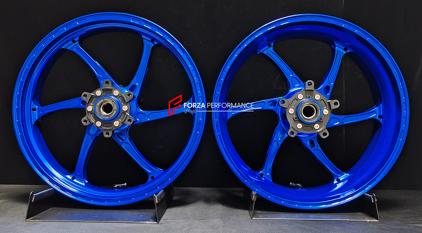 We manufacture premium quality forged motorcycle wheels rims for QJMOTOR in any design, size, color.

Wheel sizes (motorcycle spec):

Front: 3.5 x 17

Rear: 6 x 17

Weight:

Front: 4.25 kg (9.37 lbs)

Rear: 4.85 kg (10.69 lbs)


Finishing: Gloss Blue

Forza Performance Group engineers and manufactures each forged motorcycle wheel individually per order. This ensures precise fitment, uncompromised strength, and unique styling. Whether for racing, touring, or daily use — our wheels are built for both performa