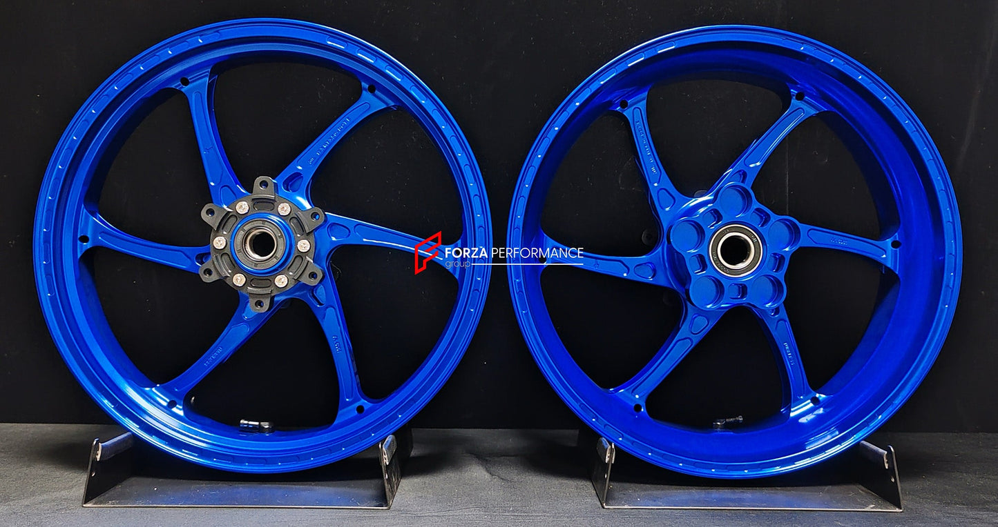 We manufacture premium quality forged motorcycle wheels rims for QJMOTOR in any design, size, color.

Wheel sizes (motorcycle spec):

Front: 3.5 x 17

Rear: 6 x 17

Weight:

Front: 4.25 kg (9.37 lbs)

Rear: 4.85 kg (10.69 lbs)


Finishing: Gloss Blue

Forza Performance Group engineers and manufactures each forged motorcycle wheel individually per order. This ensures precise fitment, uncompromised strength, and unique styling. Whether for racing, touring, or daily use — our wheels are built for both performa