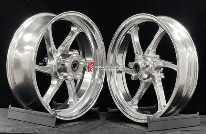 We manufacture premium quality forged motorcycle wheels rims for TRIUMPH in any design, size, color.

Wheel sizes (motorcycle spec):

Front: 3.5 x 17

Rear: 5.5 x 17

Weight:

Front: 3.95 kg (8.7 lbs)

Rear: 4.8 kg (10.58 lbs)


Finishing: Gloss Silver

Forza Performance Group engineers and manufactures each forged motorcycle wheel individually per order. This ensures precise fitment, uncompromised strength, and unique styling. Whether for racing, touring, or daily use — our wheels are built for both perfor