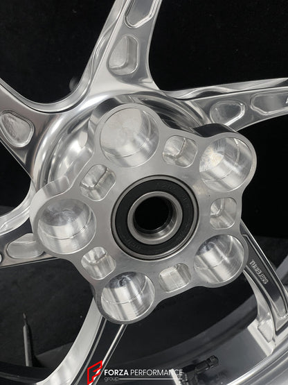 We manufacture premium quality forged motorcycle wheels rims for TRIUMPH in any design, size, color.

Wheel sizes (motorcycle spec):

Front: 3.5 x 17

Rear: 5.5 x 17

Weight:

Front: 3.95 kg (8.7 lbs)

Rear: 4.8 kg (10.58 lbs)


Finishing: Gloss Silver

Forza Performance Group engineers and manufactures each forged motorcycle wheel individually per order. This ensures precise fitment, uncompromised strength, and unique styling. Whether for racing, touring, or daily use — our wheels are built for both perfor