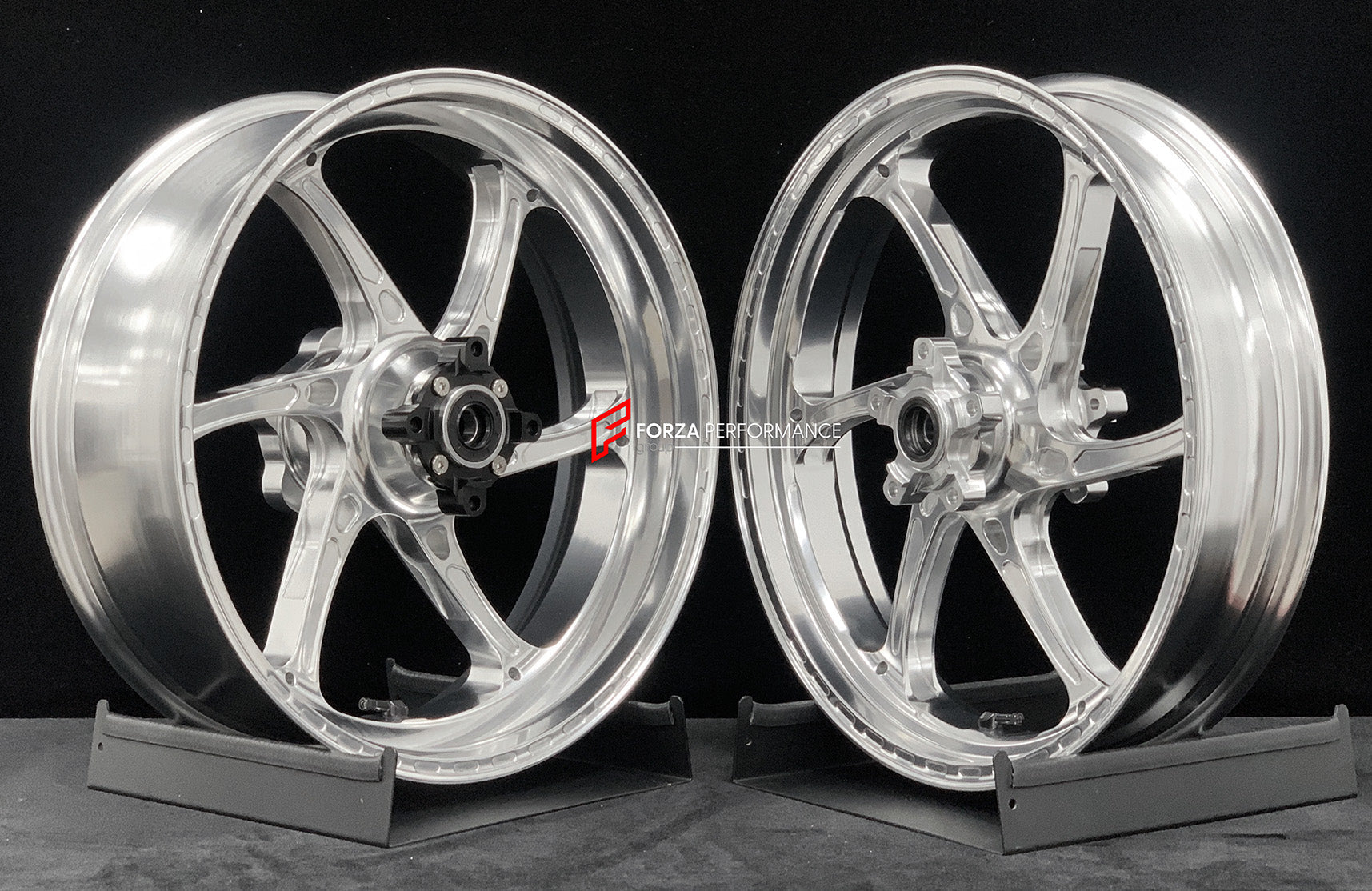 We manufacture premium quality forged motorcycle wheels rims for TRIUMPH in any design, size, color.

Wheel sizes (motorcycle spec):

Front: 3.5 x 17

Rear: 5.5 x 17

Weight:

Front: 3.95 kg (8.7 lbs)

Rear: 4.8 kg (10.58 lbs)


Finishing: Gloss Silver

Forza Performance Group engineers and manufactures each forged motorcycle wheel individually per order. This ensures precise fitment, uncompromised strength, and unique styling. Whether for racing, touring, or daily use — our wheels are built for both perfor