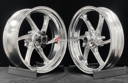 We manufacture premium quality forged motorcycle wheels rims for TRIUMPH in any design, size, color.

Wheel sizes (motorcycle spec):

Front: 3.5 x 17

Rear: 5.5 x 17

Weight:

Front: 3.95 kg (8.7 lbs)

Rear: 4.8 kg (10.58 lbs)


Finishing: Gloss Silver

Forza Performance Group engineers and manufactures each forged motorcycle wheel individually per order. This ensures precise fitment, uncompromised strength, and unique styling. Whether for racing, touring, or daily use — our wheels are built for both perfor