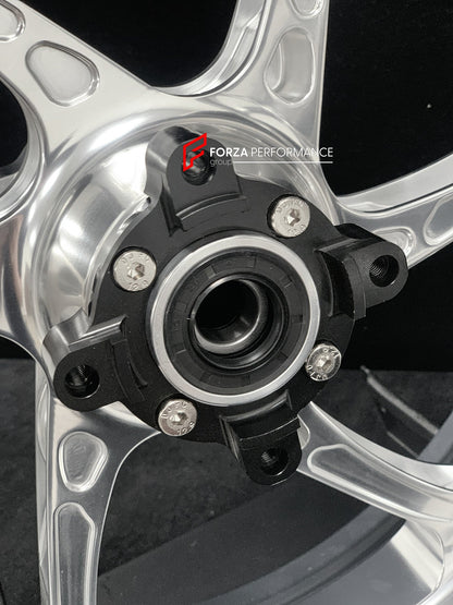 We manufacture premium quality forged motorcycle wheels rims for TRIUMPH in any design, size, color.

Wheel sizes (motorcycle spec):

Front: 3.5 x 17

Rear: 5.5 x 17

Weight:

Front: 3.95 kg (8.7 lbs)

Rear: 4.8 kg (10.58 lbs)


Finishing: Gloss Silver

Forza Performance Group engineers and manufactures each forged motorcycle wheel individually per order. This ensures precise fitment, uncompromised strength, and unique styling. Whether for racing, touring, or daily use — our wheels are built for both perfor