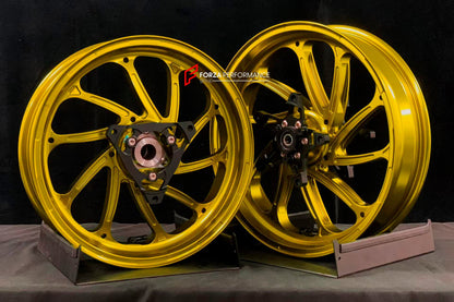 We manufacture premium quality forged motorcycle wheels rims for YAMAHA in any design, size, color.

Wheel sizes (motorcycle spec):

Front: 3.5 x 15

Rear: 4 x 14

Weight:

Front: 3.95 kg (8.71 lbs)

Rear: 3.8 kg (8.38 lbs)

Finishing: Gloss Gold

Forza Performance Group engineers and manufactures each forged motorcycle wheel individually per order. This ensures precise fitment, uncompromised strength, and unique styling. Whether for racing, touring, or daily use — our wheels are built for both performance 