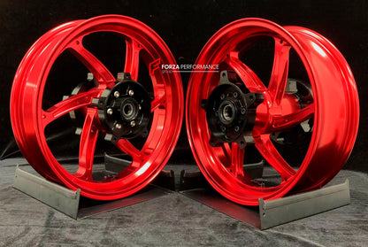 We manufacture premium quality forged motorcycle wheels rims for YAMAHA in any design, size, color.

Wheel sizes (motorcycle spec):

Front: 3.5 x 15

Rear: 4.5 x 15

Weight:

Front: 3.9 kg (9.59 lbs)

Rear: 5.35 kg (10.91 lbs)

Finishing: Gloss Red

Forza Performance Group engineers and manufactures each forged motorcycle wheel individually per order. This ensures precise fitment, uncompromised strength, and unique styling. Whether for racing, touring, or daily use — our wheels are built for both performanc