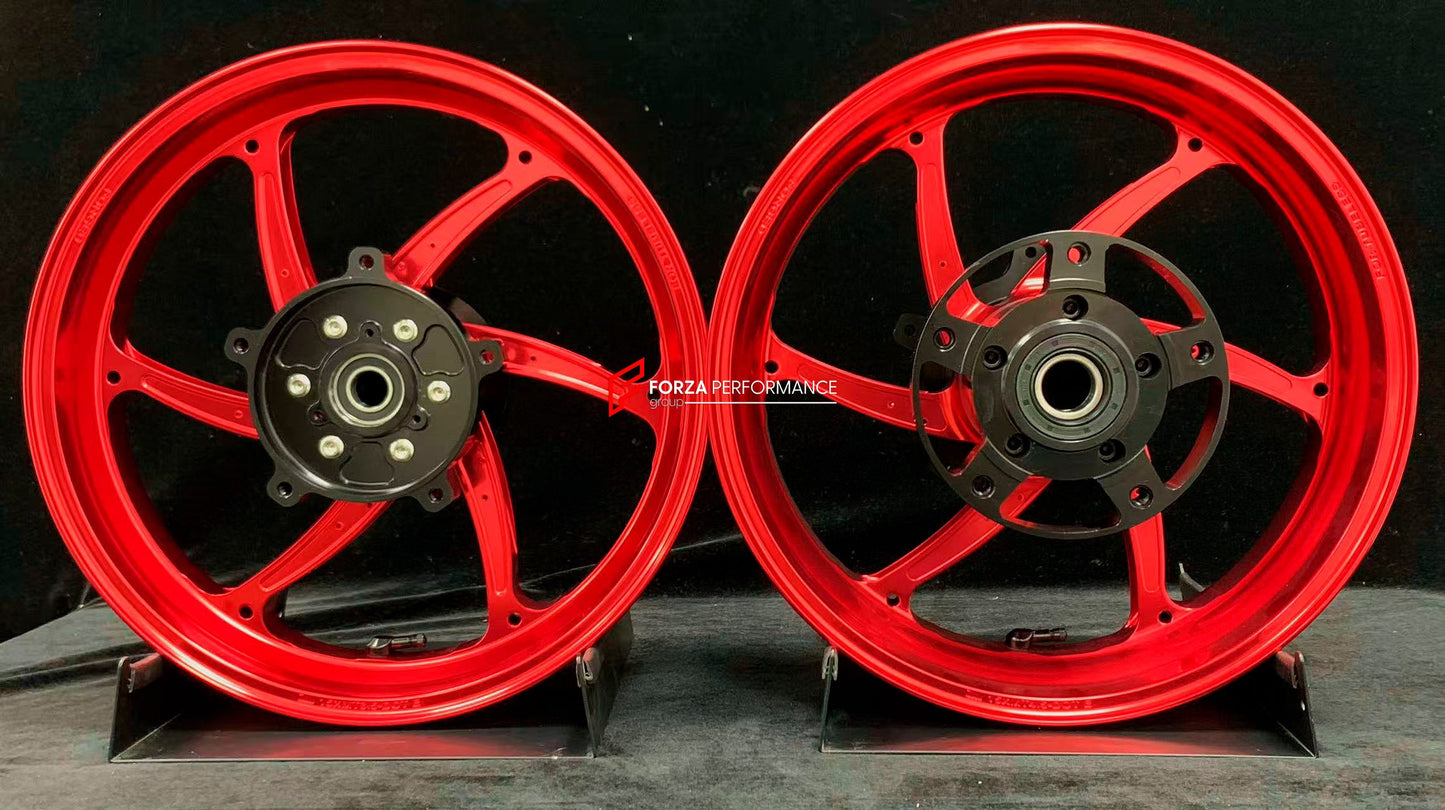 We manufacture premium quality forged motorcycle wheels rims for YAMAHA in any design, size, color.

Wheel sizes (motorcycle spec):

Front: 3.5 x 15

Rear: 4.5 x 15

Weight:

Front: 3.9 kg (9.59 lbs)

Rear: 5.35 kg (10.91 lbs)

Finishing: Gloss Red

Forza Performance Group engineers and manufactures each forged motorcycle wheel individually per order. This ensures precise fitment, uncompromised strength, and unique styling. Whether for racing, touring, or daily use — our wheels are built for both performanc