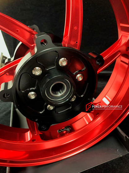 We manufacture premium quality forged motorcycle wheels rims for YAMAHA in any design, size, color.

Wheel sizes (motorcycle spec):

Front: 3.5 x 15

Rear: 4.5 x 15

Weight:

Front: 3.9 kg (9.59 lbs)

Rear: 5.35 kg (10.91 lbs)

Finishing: Gloss Red

Forza Performance Group engineers and manufactures each forged motorcycle wheel individually per order. This ensures precise fitment, uncompromised strength, and unique styling. Whether for racing, touring, or daily use — our wheels are built for both performanc
