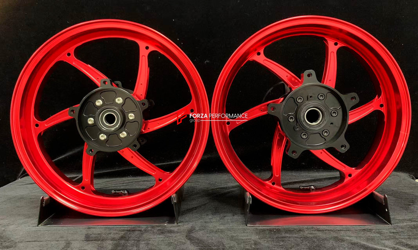 We manufacture premium quality forged motorcycle wheels rims for YAMAHA in any design, size, color.

Wheel sizes (motorcycle spec):

Front: 3.5 x 15

Rear: 4.5 x 15

Weight:

Front: 3.9 kg (9.59 lbs)

Rear: 5.35 kg (10.91 lbs)

Finishing: Gloss Red

Forza Performance Group engineers and manufactures each forged motorcycle wheel individually per order. This ensures precise fitment, uncompromised strength, and unique styling. Whether for racing, touring, or daily use — our wheels are built for both performanc