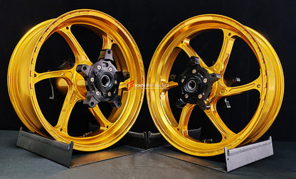 We manufacture premium quality forged motorcycle wheels rims for YAMAHA in any design, size, color.

Wheel sizes (motorcycle spec):

Front: 3.5 x 15

Rear: 4.5 x 15

Weight:

Front: 3.6 kg (7.94 lbs)

Rear: 4.75 kg (10.47 lbs)


Finishing: Gloss Gold

Forza Performance Group engineers and manufactures each forged motorcycle wheel individually per order. This ensures precise fitment, uncompromised strength, and unique styling. Whether for racing, touring, or daily use — our wheels are built for both performa