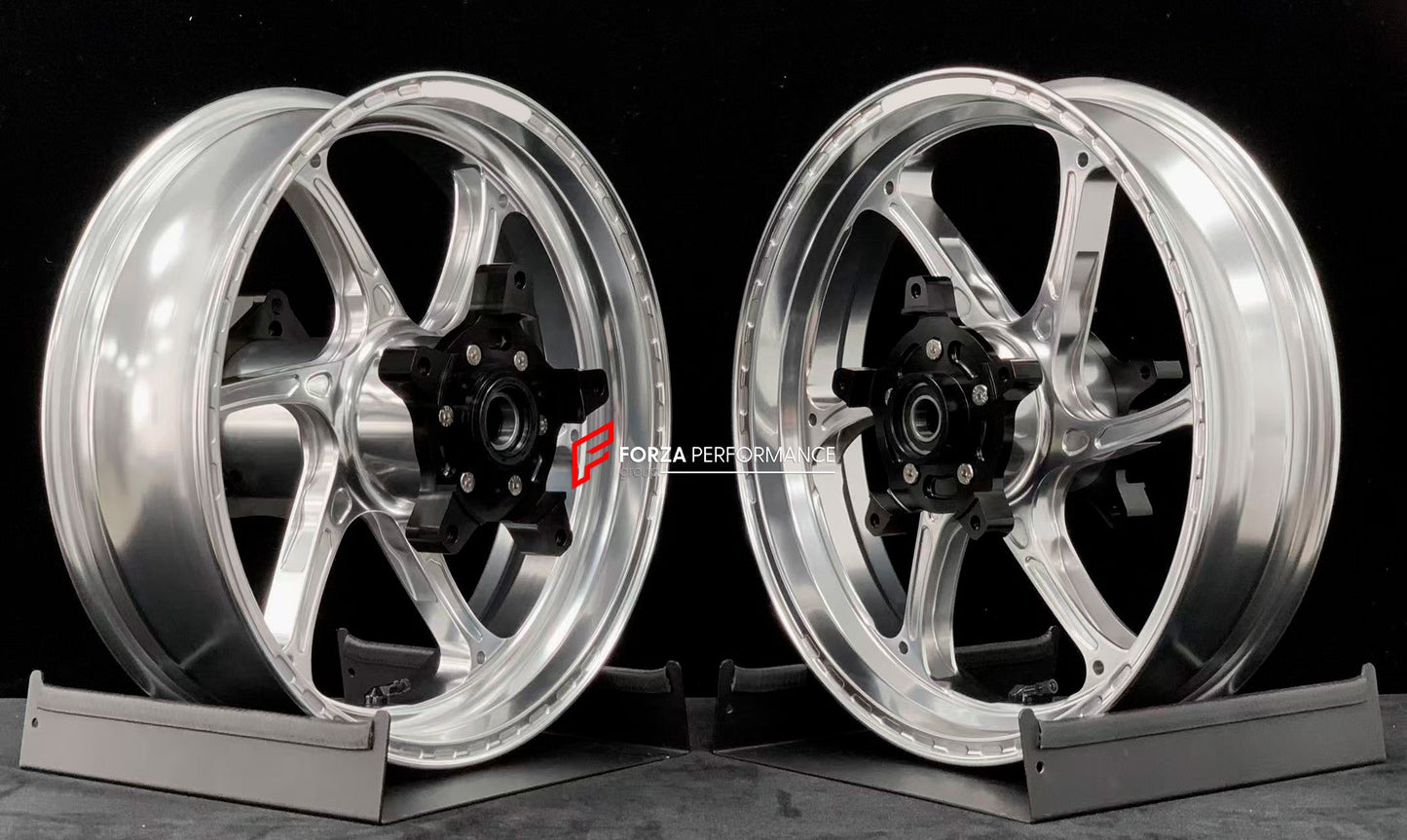 We manufacture premium quality forged motorcycle wheels rims for YAMAHA in any design, size, color.

Wheel sizes (motorcycle spec):

Front: 3.5 x 15

Rear: 4.5 x 15

Weight:

Front: 3.6 kg (7.94 lbs)

Rear: 4.75 kg (10.47 lbs)


Finishing: Gloss Silver

Forza Performance Group engineers and manufactures each forged motorcycle wheel individually per order. This ensures precise fitment, uncompromised strength, and unique styling. Whether for racing, touring, or daily use — our wheels are built for both perfor