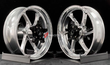 We manufacture premium quality forged motorcycle wheels rims for YAMAHA in any design, size, color.

Wheel sizes (motorcycle spec):

Front: 3.5 x 15

Rear: 4.5 x 15

Weight:

Front: 3.6 kg (7.94 lbs)

Rear: 4.75 kg (10.47 lbs)


Finishing: Gloss Silver

Forza Performance Group engineers and manufactures each forged motorcycle wheel individually per order. This ensures precise fitment, uncompromised strength, and unique styling. Whether for racing, touring, or daily use — our wheels are built for both perfor