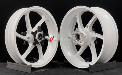 We manufacture premium quality forged motorcycle wheels rims for YAMAHA in any design, size, color.

Wheel sizes (motorcycle spec):

Front: 3.5 x 17

Rear: 5.5 x 17

Weight:

Front: 4.35 kg (9.59 lbs)

Rear: 4.95 kg (10.91 lbs)


Finishing: Gloss White

Forza Performance Group engineers and manufactures each forged motorcycle wheel individually per order. This ensures precise fitment, uncompromised strength, and unique styling. Whether for racing, touring, or daily use — our wheels are built for both perfor