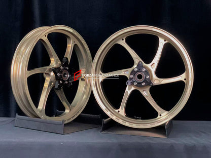We manufacture premium quality forged motorcycle wheels rims for YAMAHA in any design, size, color.

Wheel sizes (motorcycle spec):

Front: 3 x 17

Rear: 4 x 17

Weight:

Front: 3.1 kg (6.83 lbs)

Rear: 3.55 kg (7.83 lbs)


Finishing: Satin Bronze

Forza Performance Group engineers and manufactures each forged motorcycle wheel individually per order. This ensures precise fitment, uncompromised strength, and unique styling. Whether for racing, touring, or daily use — our wheels are built for both performance