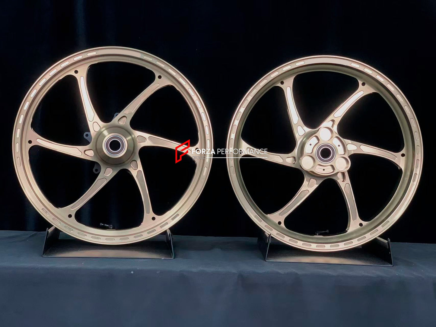 We manufacture premium quality forged motorcycle wheels rims for YAMAHA in any design, size, color.

Wheel sizes (motorcycle spec):

Front: 3 x 17

Rear: 4 x 17

Weight:

Front: 3.1 kg (6.83 lbs)

Rear: 3.55 kg (7.83 lbs)


Finishing: Satin Bronze

Forza Performance Group engineers and manufactures each forged motorcycle wheel individually per order. This ensures precise fitment, uncompromised strength, and unique styling. Whether for racing, touring, or daily use — our wheels are built for both performance