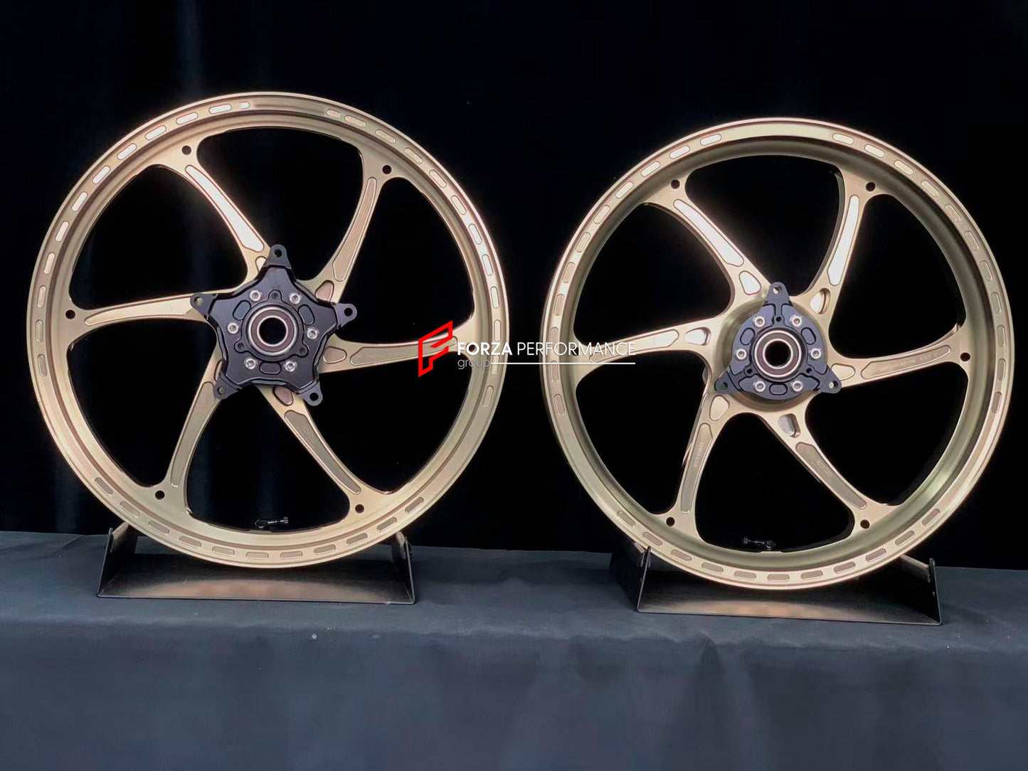 We manufacture premium quality forged motorcycle wheels rims for YAMAHA in any design, size, color.

Wheel sizes (motorcycle spec):

Front: 3 x 17

Rear: 4 x 17

Weight:

Front: 3.1 kg (6.83 lbs)

Rear: 3.55 kg (7.83 lbs)


Finishing: Satin Bronze

Forza Performance Group engineers and manufactures each forged motorcycle wheel individually per order. This ensures precise fitment, uncompromised strength, and unique styling. Whether for racing, touring, or daily use — our wheels are built for both performance