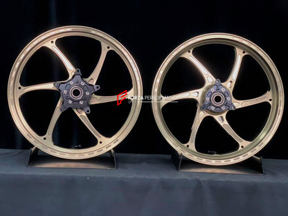 We manufacture premium quality forged motorcycle wheels rims for YAMAHA in any design, size, color.

Wheel sizes (motorcycle spec):

Front: 3 x 17

Rear: 4 x 17

Weight:

Front: 3.1 kg (6.83 lbs)

Rear: 3.55 kg (7.83 lbs)


Finishing: Satin Bronze

Forza Performance Group engineers and manufactures each forged motorcycle wheel individually per order. This ensures precise fitment, uncompromised strength, and unique styling. Whether for racing, touring, or daily use — our wheels are built for both performance