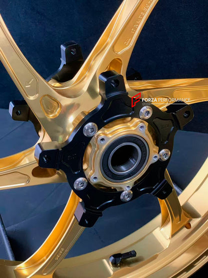 We manufacture premium quality forged motorcycle wheels rims for YAMAHA in any design, size, color.

Wheel sizes (motorcycle spec):

Front: 3.5 x 17

Rear: 6 x 17

Weight:

Front: 3.95 kg (8.7 lbs)

Rear: 4.9 kg (10.8 lbs)

Finishing: Gloss Gold

Forza Performance Group engineers and manufactures each forged motorcycle wheel individually per order. This ensures precise fitment, uncompromised strength, and unique styling. Whether for racing, touring, or daily use — our wheels are built for both performance a