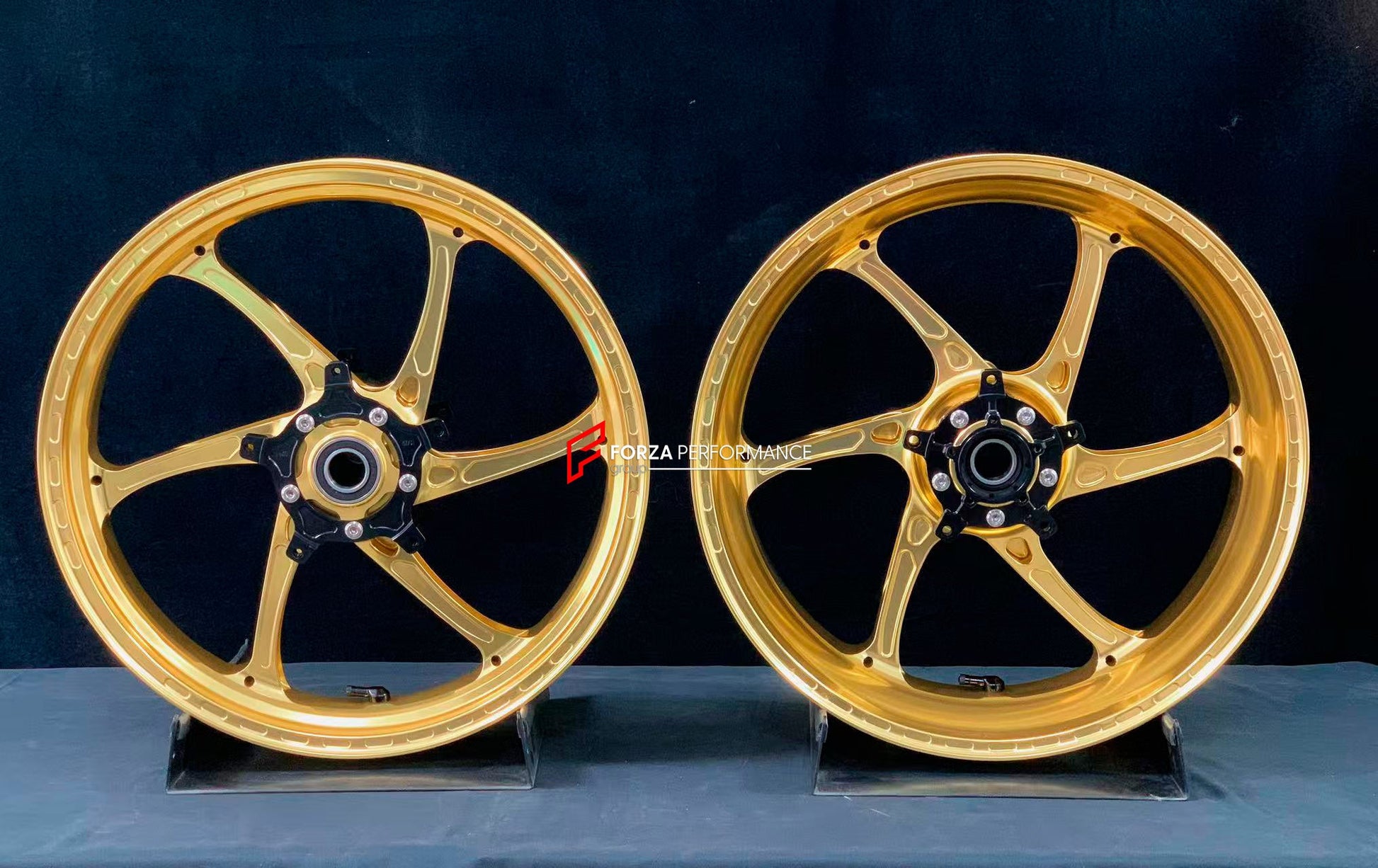 We manufacture premium quality forged motorcycle wheels rims for YAMAHA in any design, size, color.

Wheel sizes (motorcycle spec):

Front: 3.5 x 17

Rear: 6 x 17

Weight:

Front: 3.95 kg (8.7 lbs)

Rear: 4.9 kg (10.8 lbs)

Finishing: Gloss Gold

Forza Performance Group engineers and manufactures each forged motorcycle wheel individually per order. This ensures precise fitment, uncompromised strength, and unique styling. Whether for racing, touring, or daily use — our wheels are built for both performance a